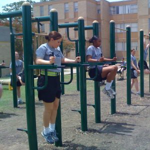 Two women training on separate 2-Person Static Combos