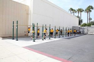 ROTC students using outdoor fitness rig at Santa Ana High School