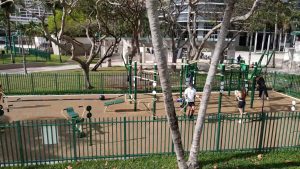 An outdoor gym with a fence surrounding it at Margaret Pace Park