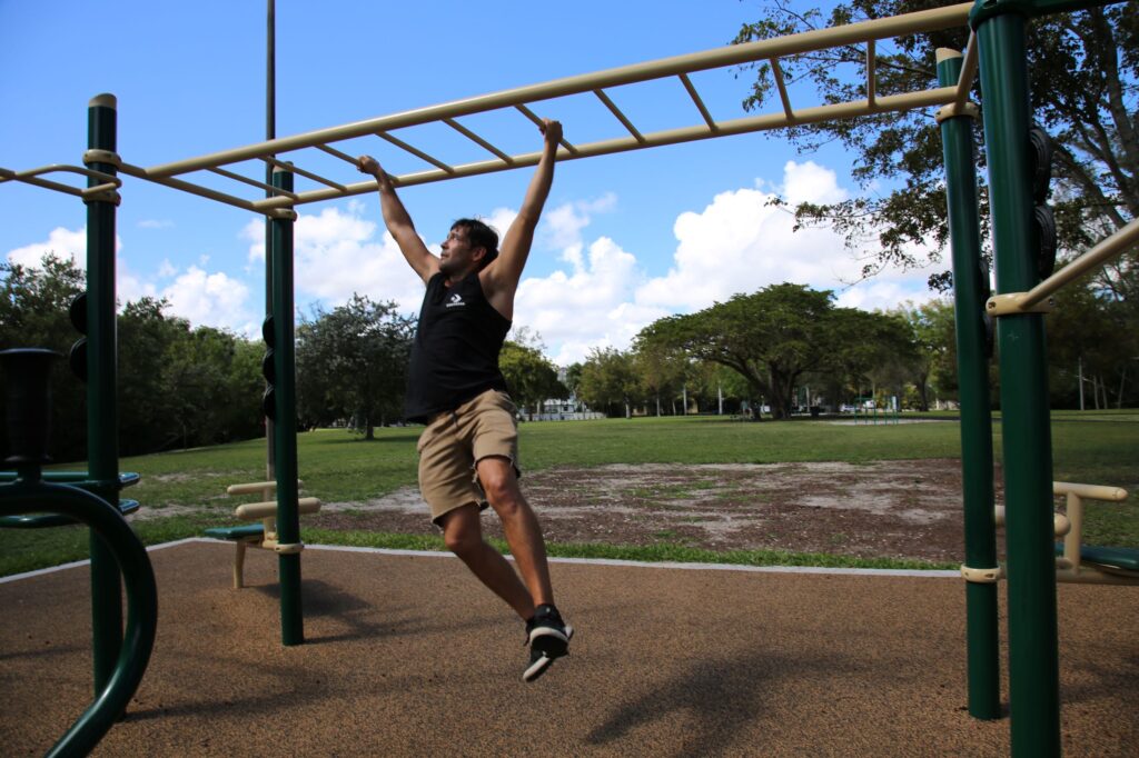 A man using the Horizontal Ladder