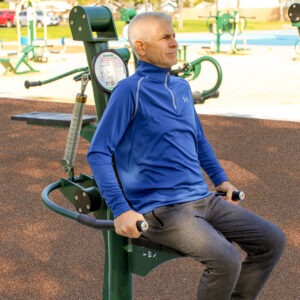 A man exercising on the tricep press