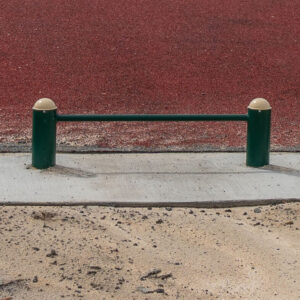 Push Up Bar next to a red wall