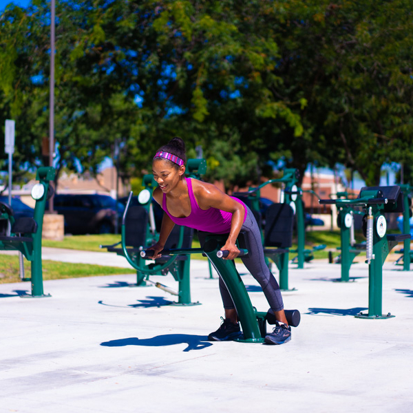 A woman using back extension to exercise