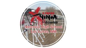 A circle cut-out with a X-Treme Ninja Course in the background. In the center of the circle, written in text is says X-Treme Ninja by Greenfields Valencia High School Los Lunas, NM