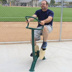 A man using the upright bike