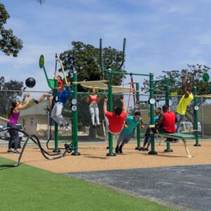 People exercising on the functional fitness rig