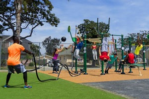 A group exercising on the Functional Fitness Rig
