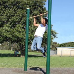 A man using the Pull-Up Station