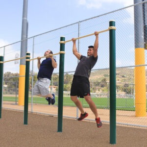 Two men doing pull-ups on the 3-Person Pull-Up Station