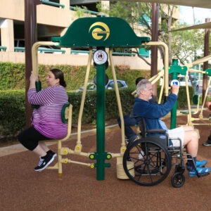 A man and a woman using wheelchair accessible butterfly and reverse fly