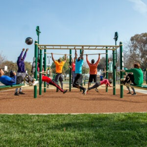 A group of people exercising on the 13-Person Cross Fitness Rig