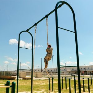A soldier using the Rope Climbing Station